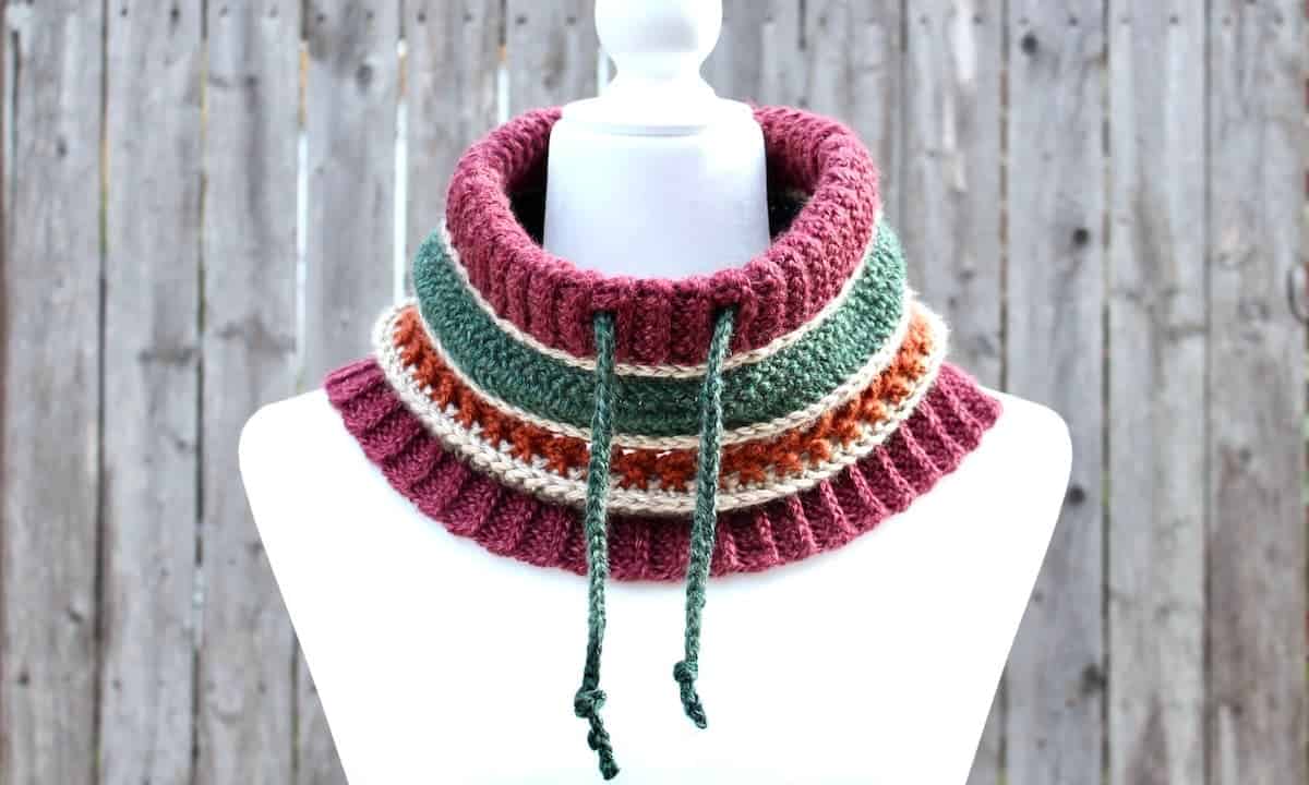 crochet striped cowl in autumn colours with split ribbed hem and drawstring closure