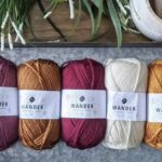 5 warm colours of Furls Wander Acrylic Yarn