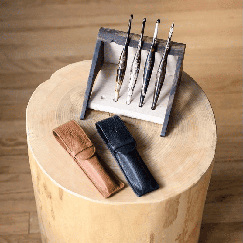 Furls Crochet hooks on a stand with leather holders