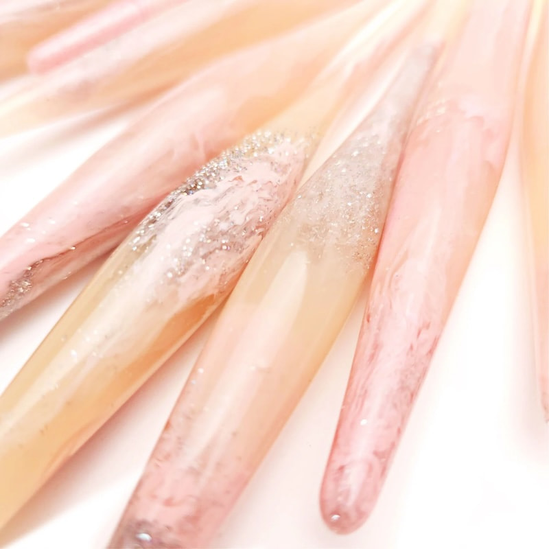 pink, champagne and silver glitter resin crochet hooks
